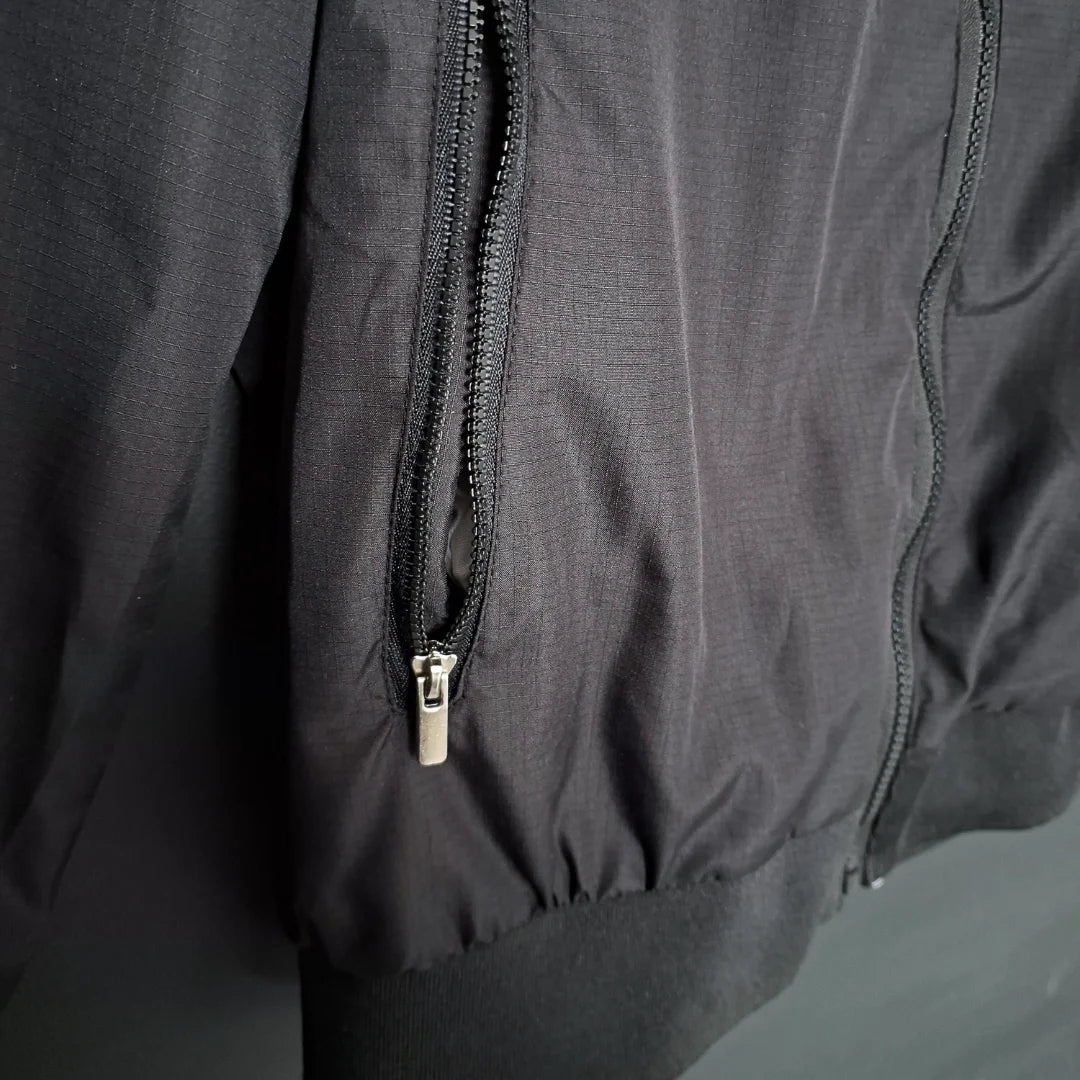 CHAQUETA PSG JORDAN NEGRA Y BLANCA
